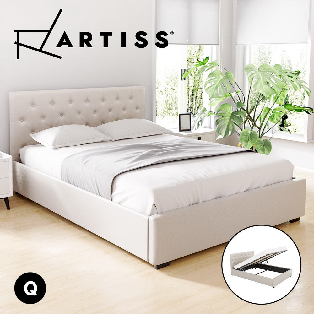 Beige upholstered bed with tufted headboard in a bright room with plants, featuring the Artiss brand.